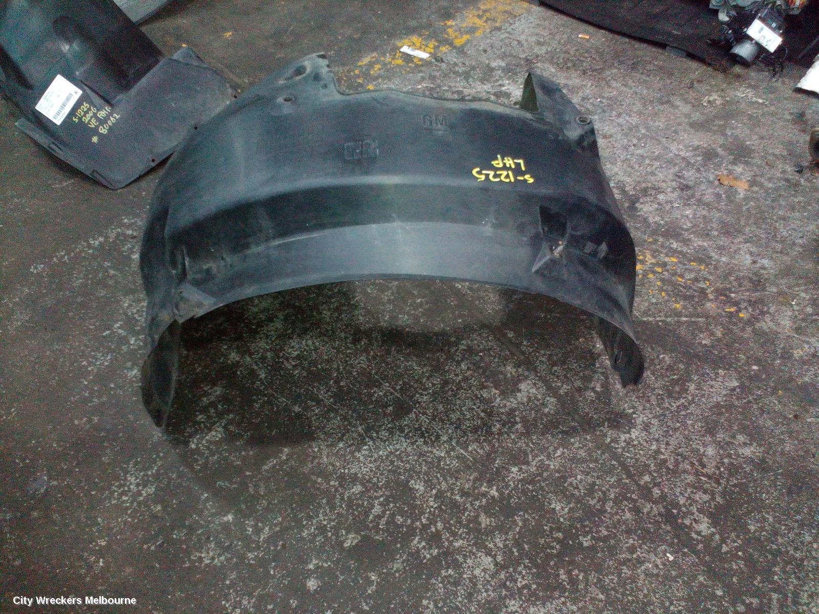 HOLDEN COMMODORE LEFT GUARD LINER, VE, FRONT, 08/2006 - 04/2013 - Image 1