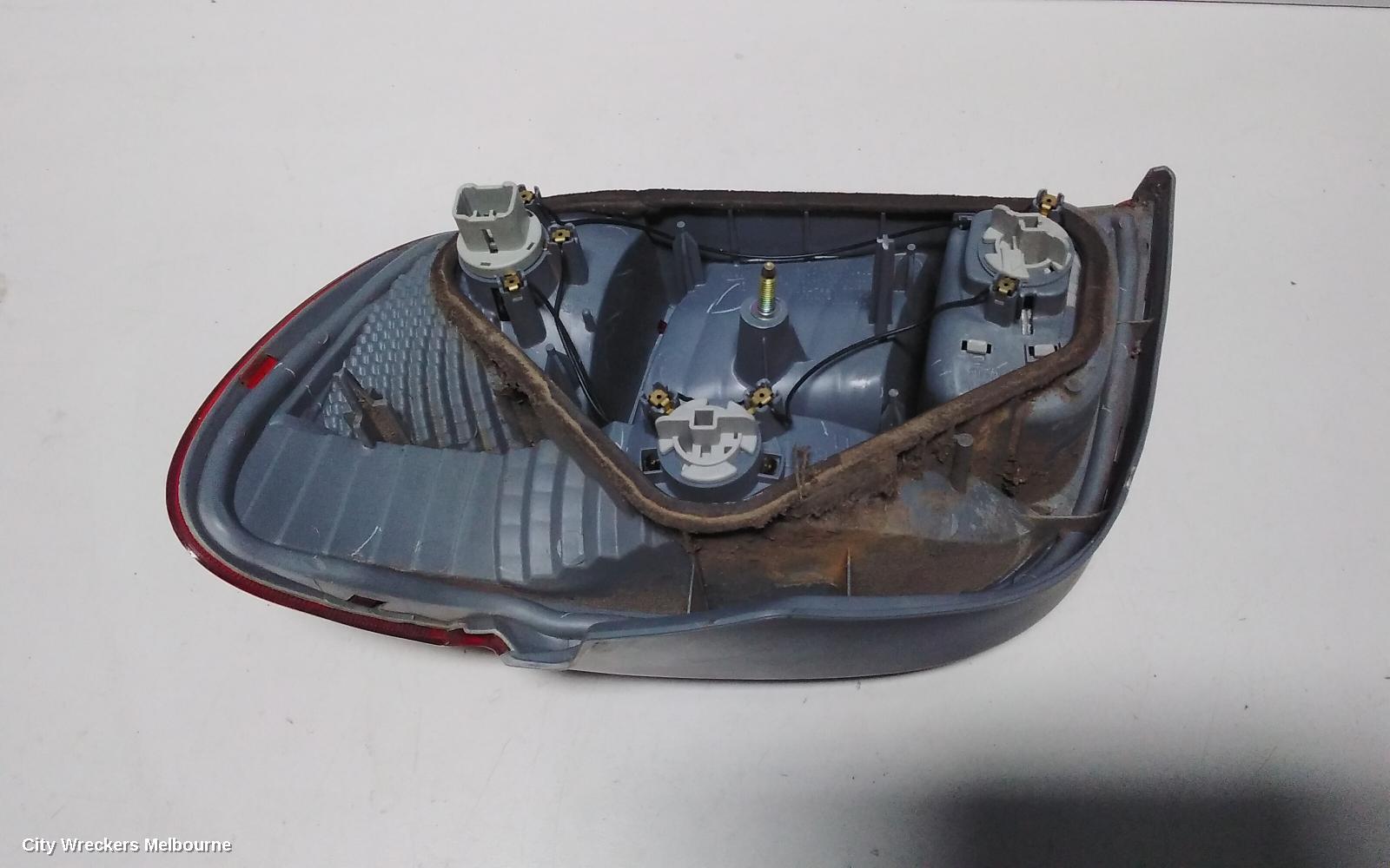 TOYOTA ECHO LEFT TAILLIGHT, NCP10R, HATCH, LENS# 52-049, 10/2002 - 09/2005 - Image 3
