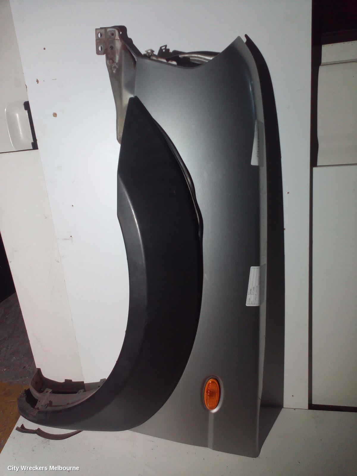 NISSAN NAVARA LEFT GUARD, D22, FLARED TYPE, 12/2001 - 11/2008 - Image 1