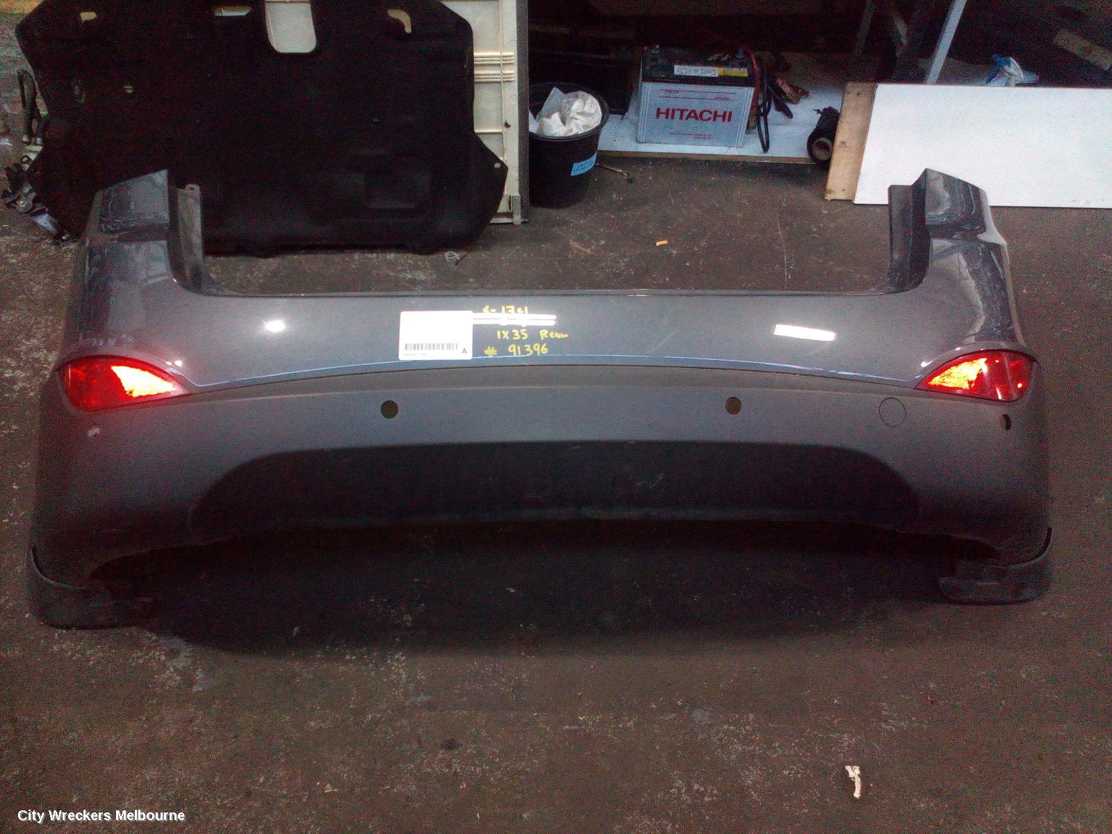 HYUNDAI IX35 REAR BUMPER, LM SERIES, BUMPER BAR (2 PIECE), NON SE/TROPHY, W/ PARK SENSOR TYPE, 11/2009 - 01/2016 - Image 1