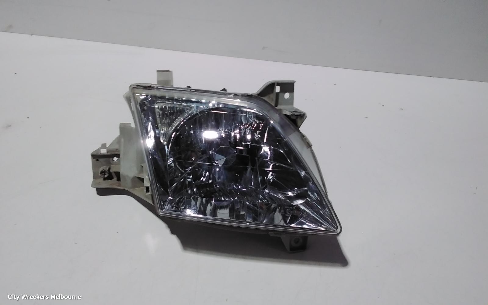 MAZDA MPV RIGHT HEADLAMP, LW, LENS # STANLEY R6899, 08/1999 - 05/2002 - Image 1