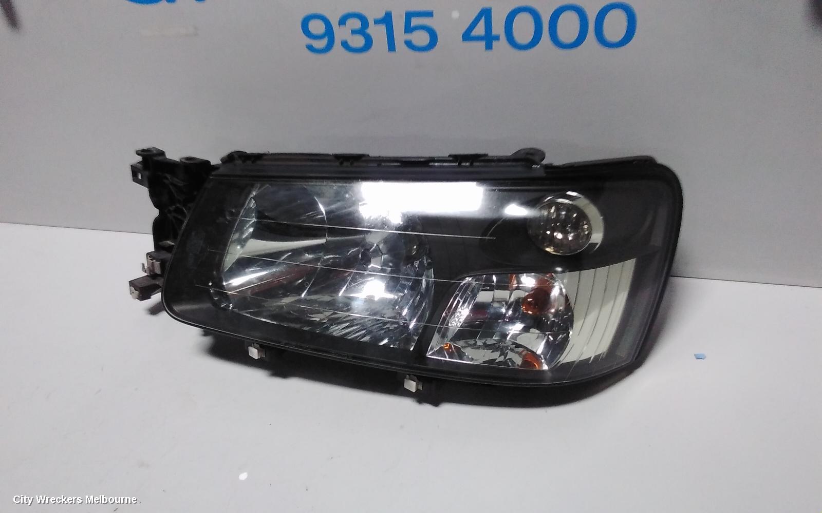 SUBARU FORESTER LEFT HEADLAMP, BLACK INSERT (CURVED LINES), LENS# 1700, 08/2004 - 05/2005 - Image 3