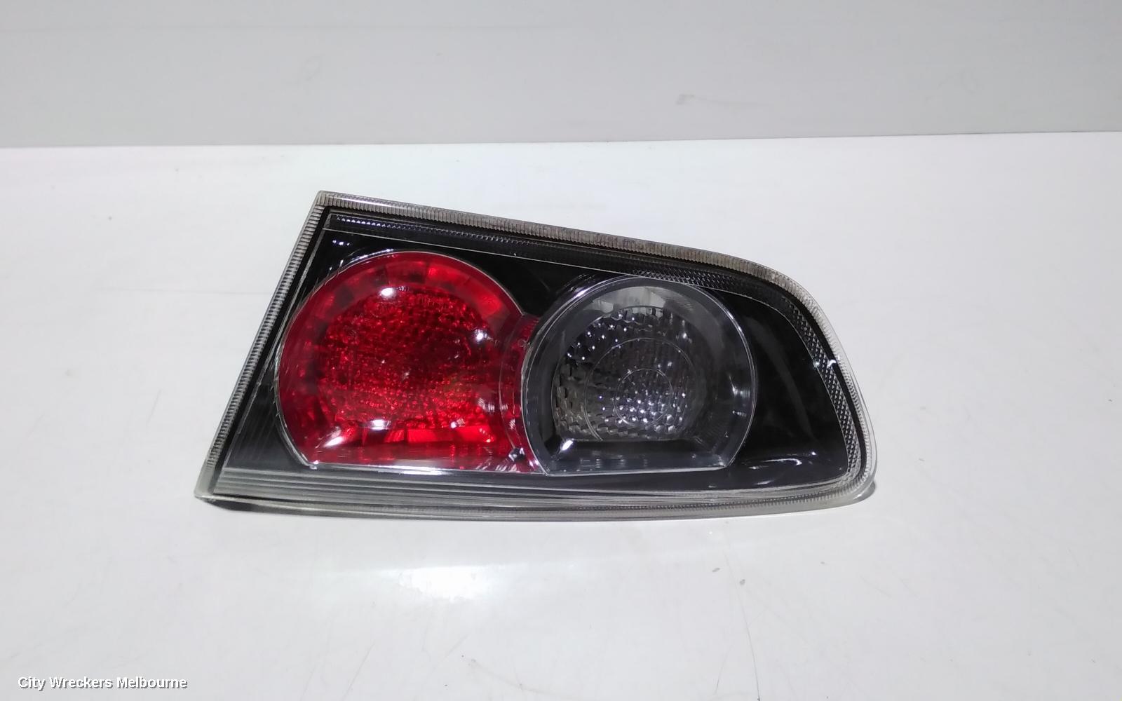 MITSUBISHI LANCER REAR GARNISH, BOOTLID LAMP (RH SIDE), CJ-CF, SEDAN, BLACK INSERT TYPE, 07/2007 - 12/2017 - Image 1