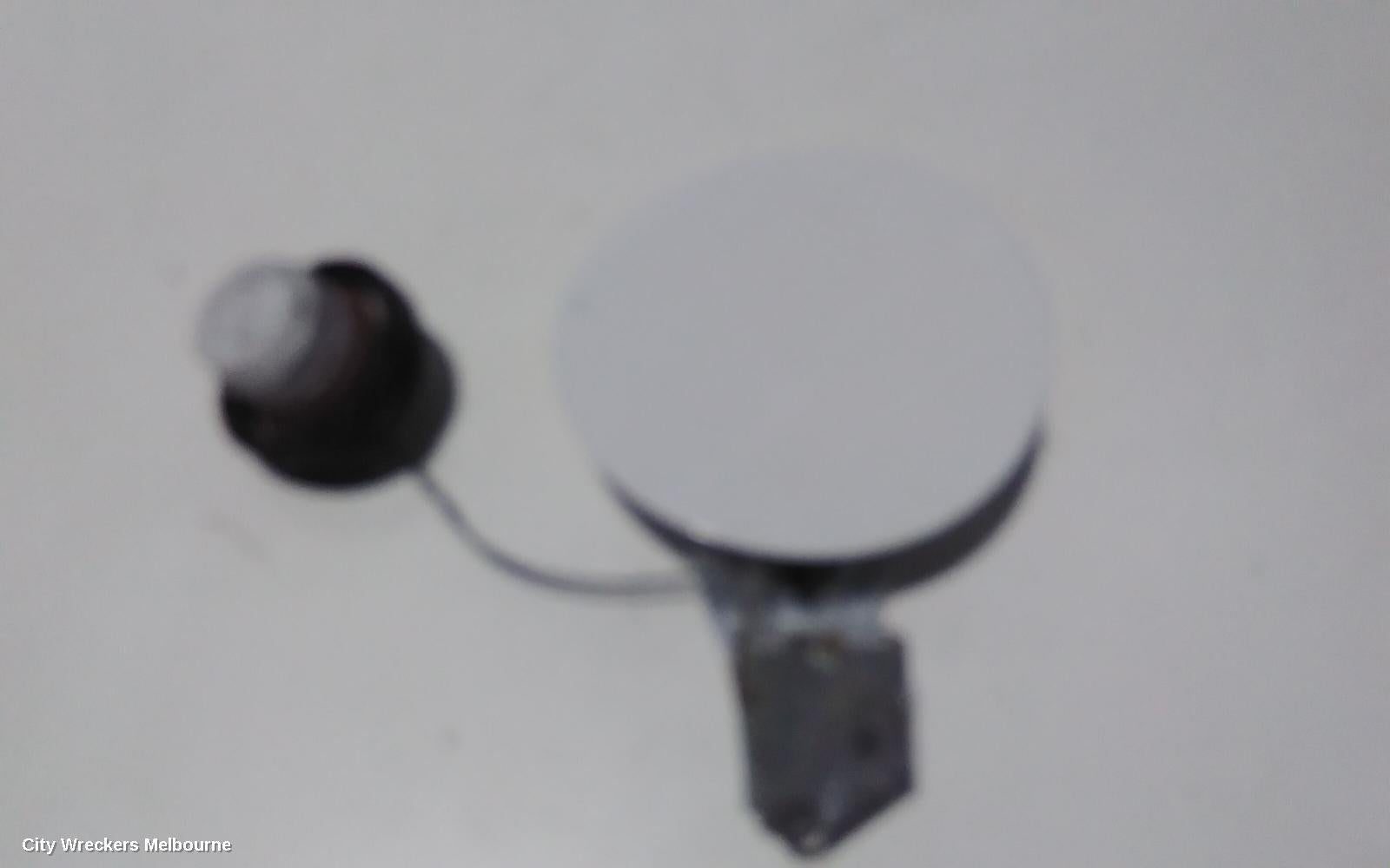 HOLDEN COLORADO FUEL DOOR / FILLER, FUEL FLAP, RG, 06/2012 - 12/2020 - Image 1