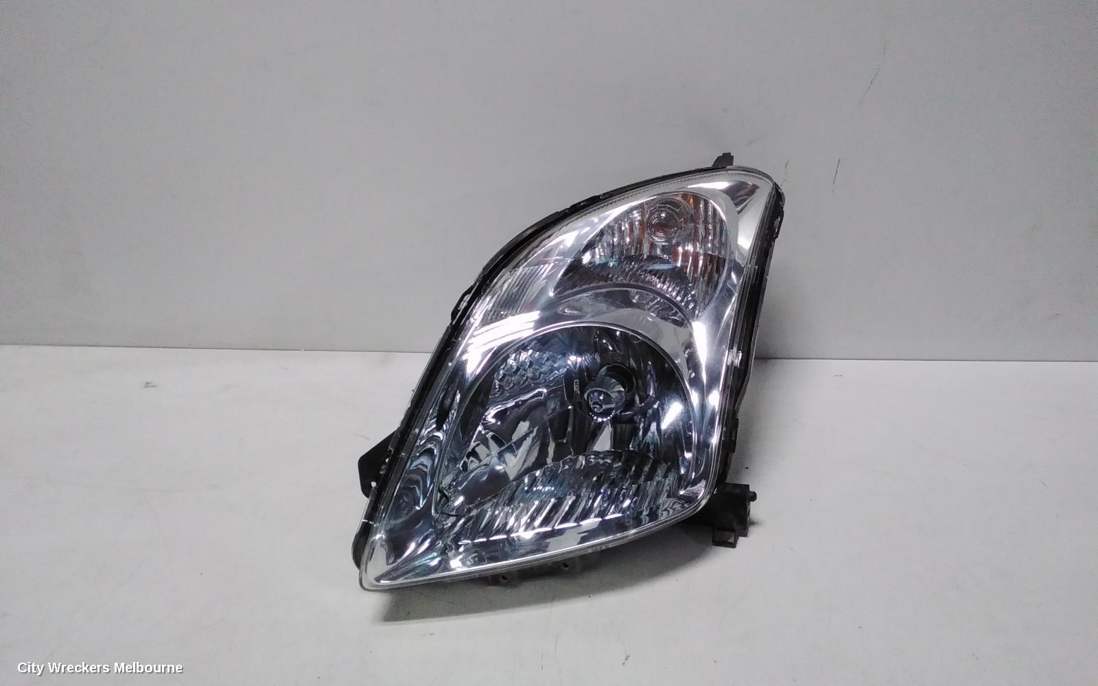 SUZUKI SWIFT LEFT HEADLAMP, RS415, MAN BEAM ADJUSTMENT, CHROME INSERT TYPE, 09/2004 - 02/2011 - Image 1