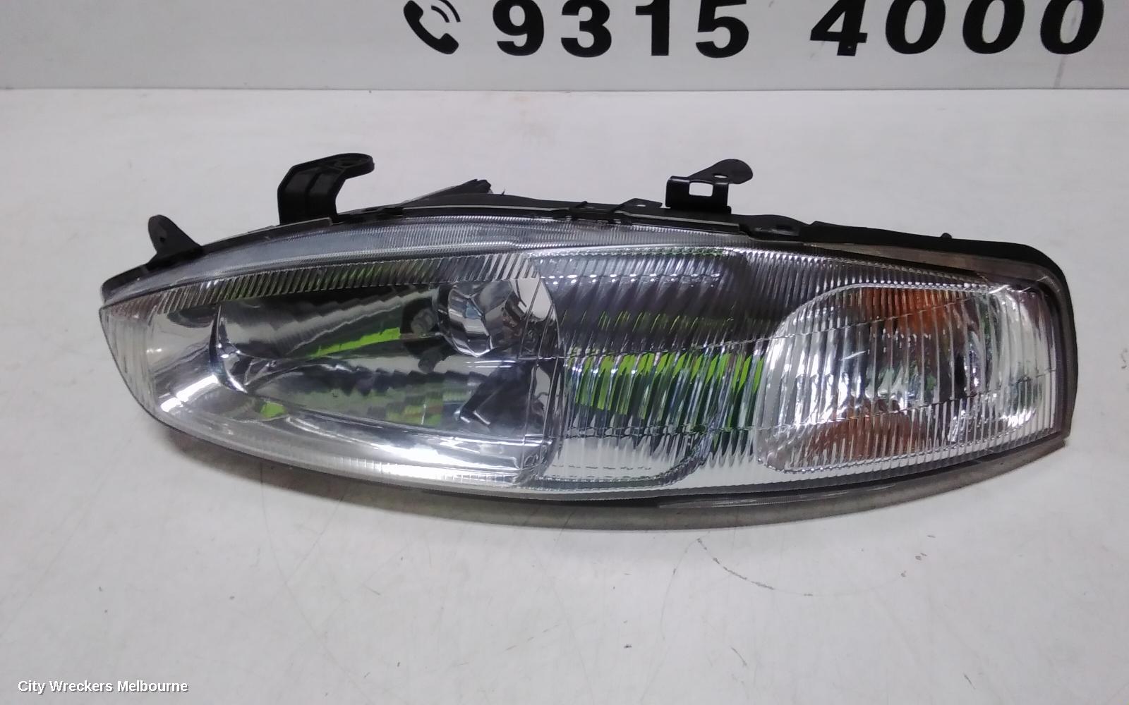 MITSUBISHI LANCER LEFT HEADLAMP, CE/CJ, LANCER (MIRAGE NZ), HATCH/COUPE, 1 PIECE W/ CORNER LAMP, PLASTIC TYPE, 07/1996 - 08/2003 - Image 3
