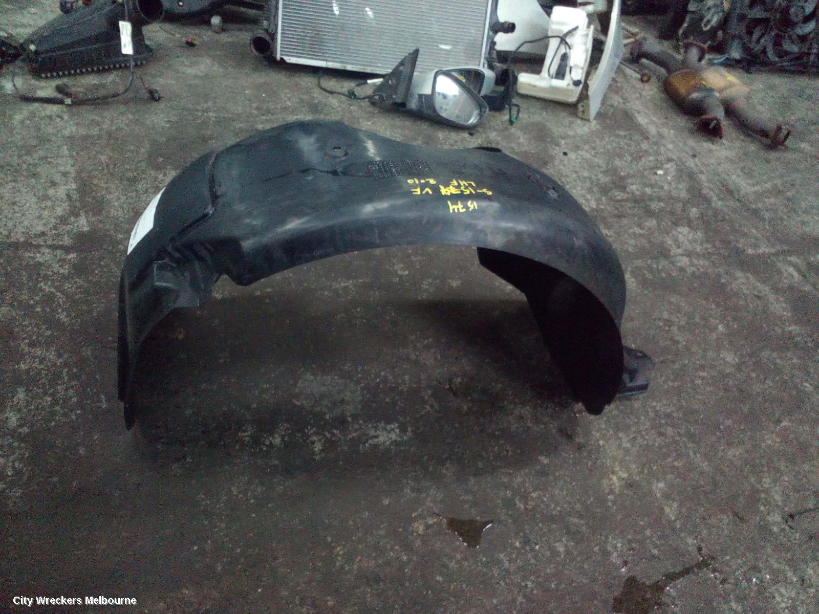 HOLDEN COMMODORE LEFT GUARD LINER, VE, FRONT, 08/2006 - 04/2013 - Image 1