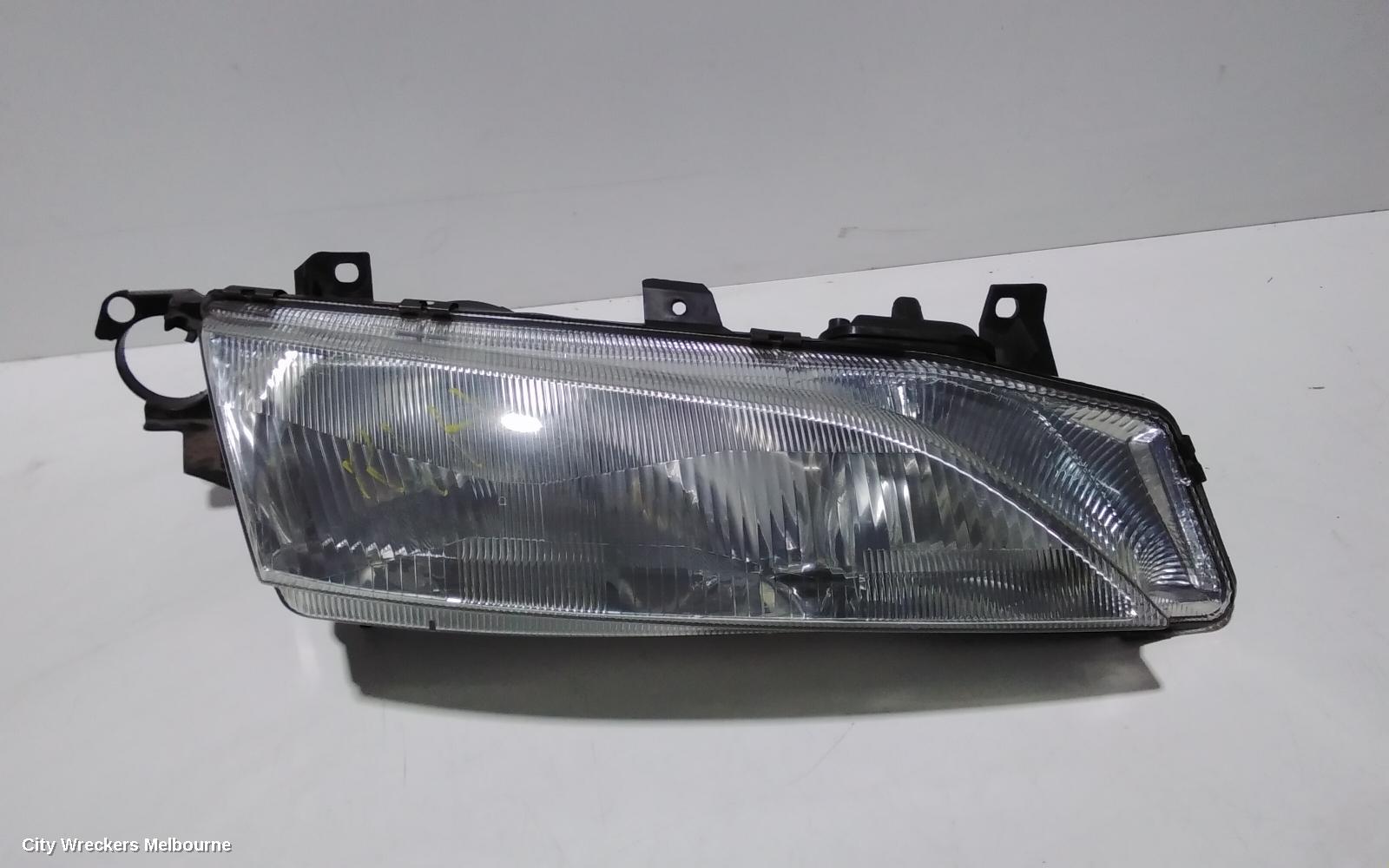 FORD FALCON RIGHT HEADLAMP, EL, SEDAN/WAGON, 10/1996 - 09/1998 - Image 1