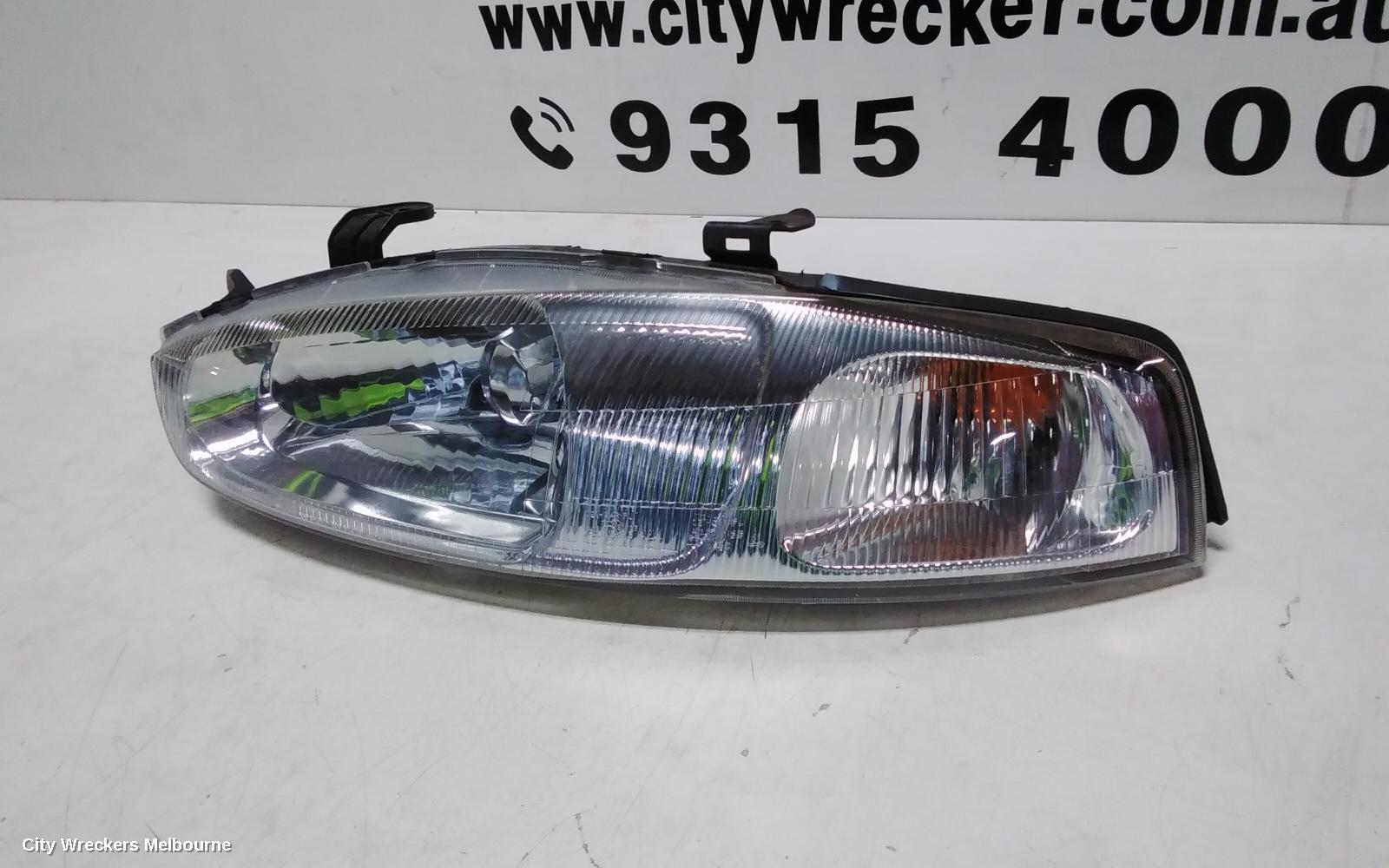 MITSUBISHI LANCER LEFT HEADLAMP, CE/CJ, LANCER (MIRAGE NZ), HATCH/COUPE, 1 PIECE W/ CORNER LAMP, PLASTIC TYPE, 07/1996 - 08/2003 - Image 3