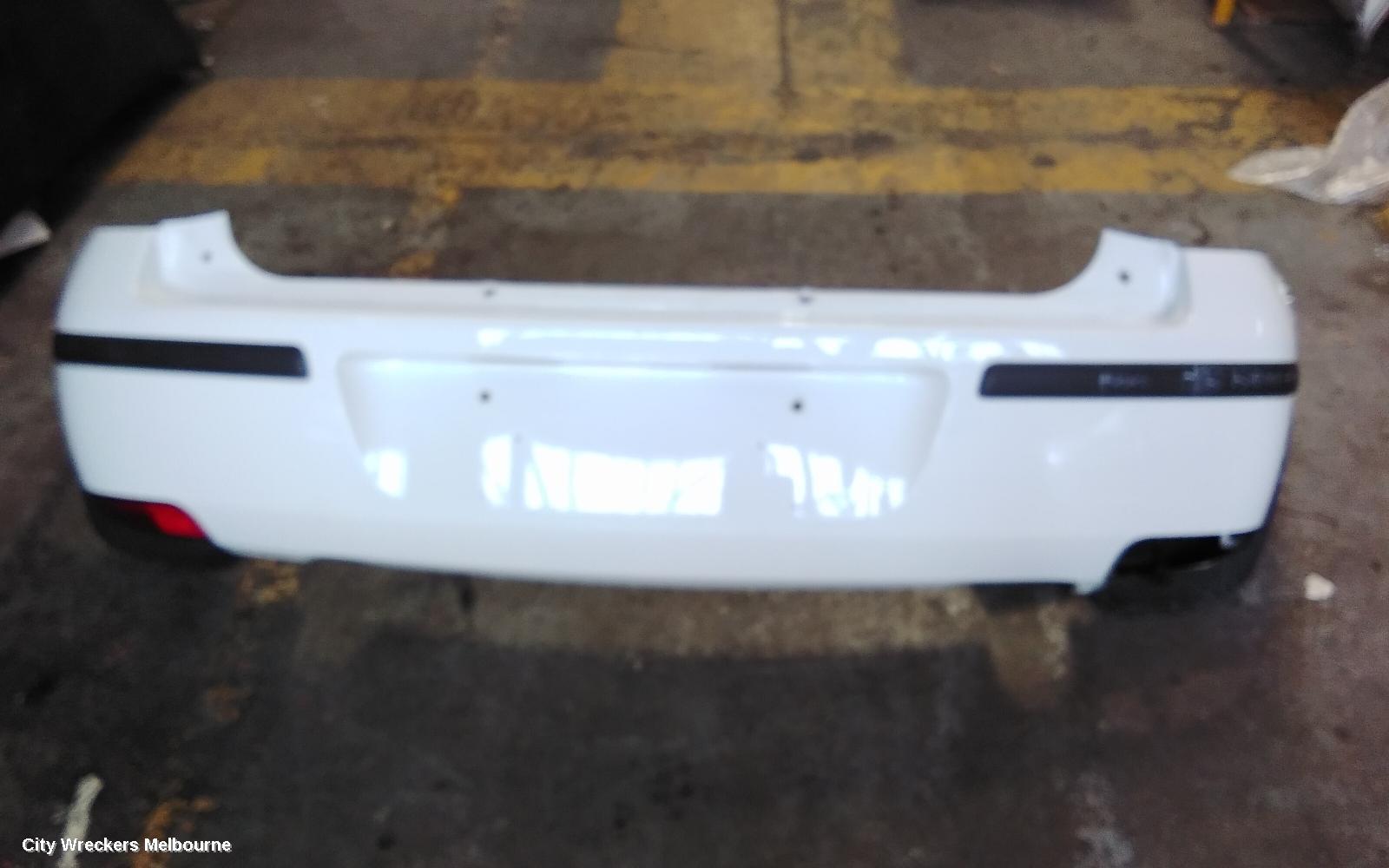 HOLDEN BARINA REAR BUMPER, BUMPER BAR, HATCH, LAST 8 DIGITS OF VIN IS FROM  44000001-, (REFLECTORS ON BOTTOM), XC, 03/2001 - 11/2005 - Image 3