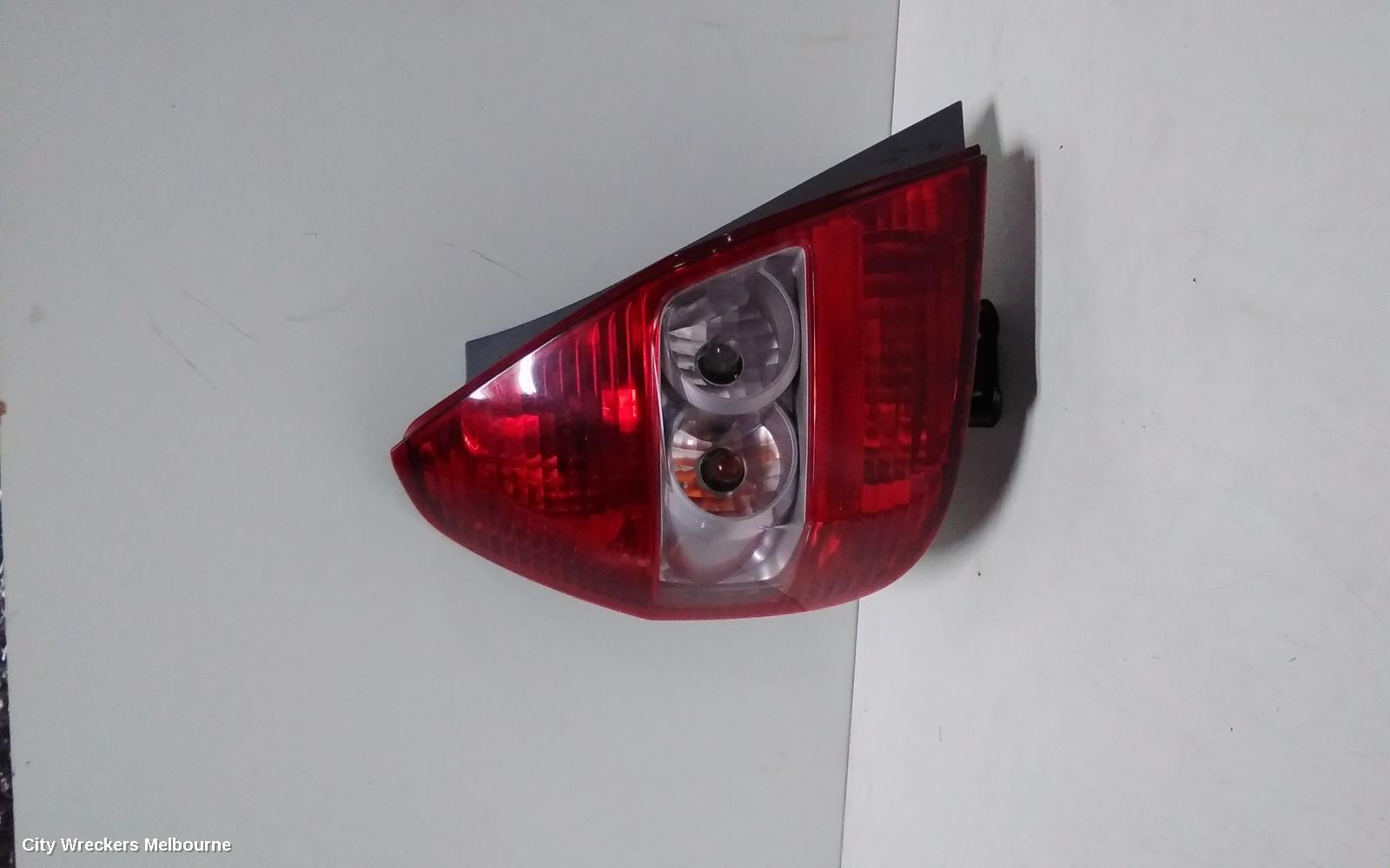 HONDA JAZZ LEFT TAILLIGHT, GD, GLI/VTI, ICHIKOH LENS# 4949, 10/2002 - 02/2006 (AUS ONLY) - Image 1