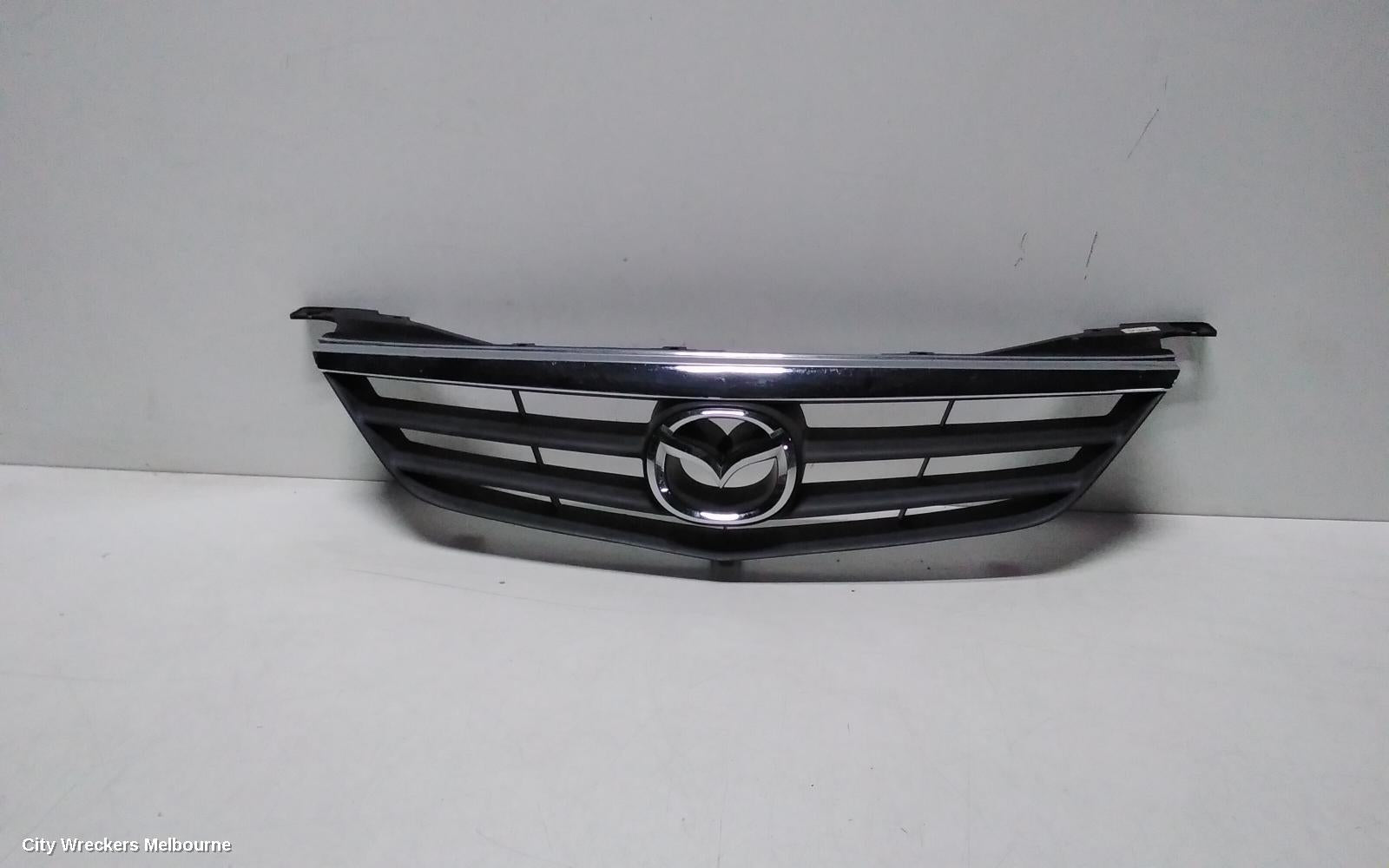 MAZDA 626 GRILLE, GF/GW, TYPE 1 AS PER IMAGE, 11/1999 - 08/2002 - Image 1
