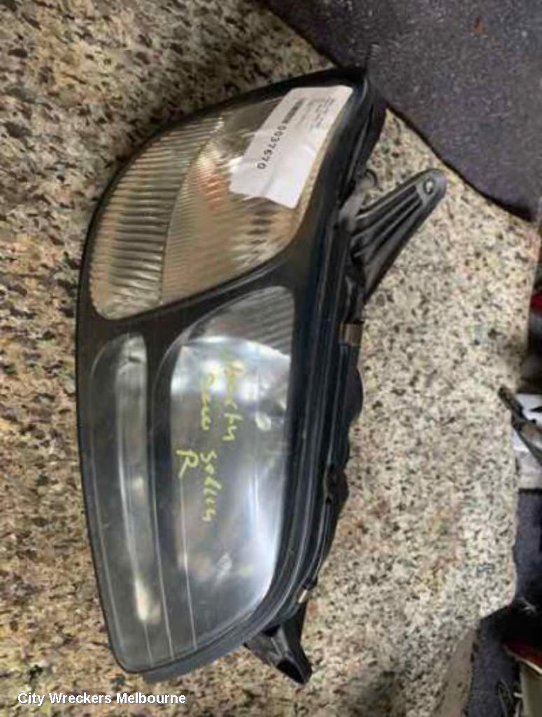 SUBARU LIBERTY RIGHT HEADLAMP, 3RD GEN, BLACK INSERT, 11/1998 - 06/2001 - Image 1