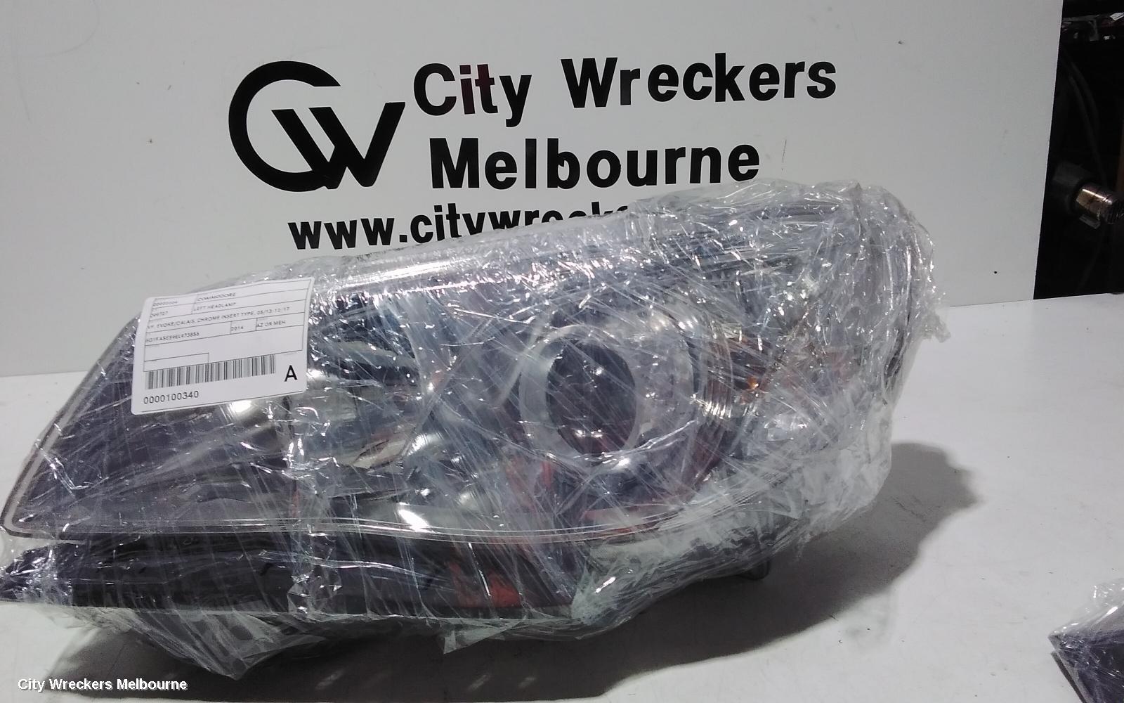 HOLDEN COMMODORE LEFT HEADLAMP, VF, EVOKE/CALAIS, CHROME INSERT TYPE, 05/2013 - 12/2017 - Image 1