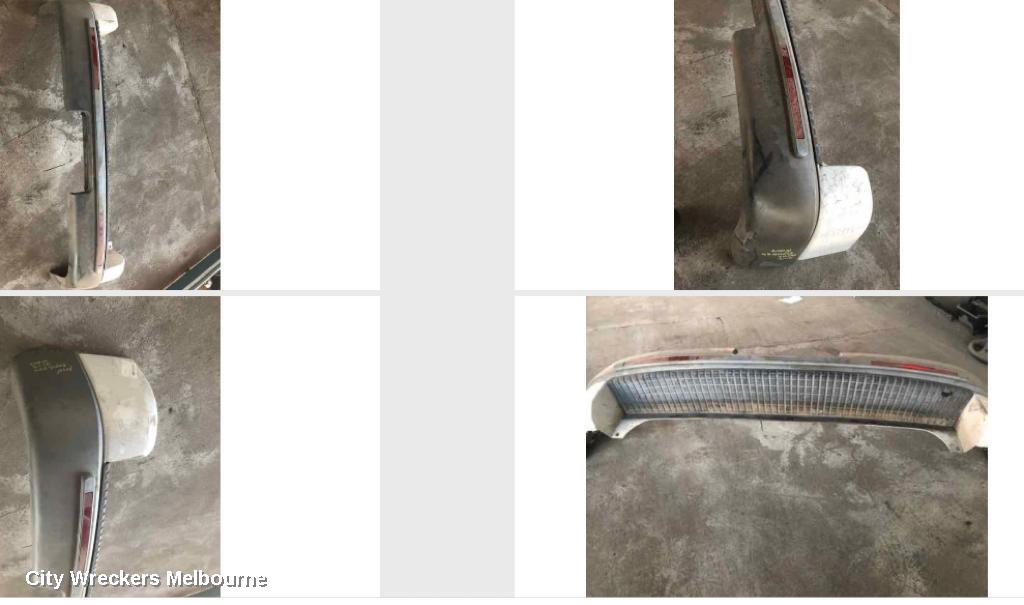 MITSUBISHI L300 REAR BUMPER, SJ-SK, COMPLETE, 3 PIECES, REFLECTOR ON ENDS TYPE, 09/1994 - 12/2013 - Image 1