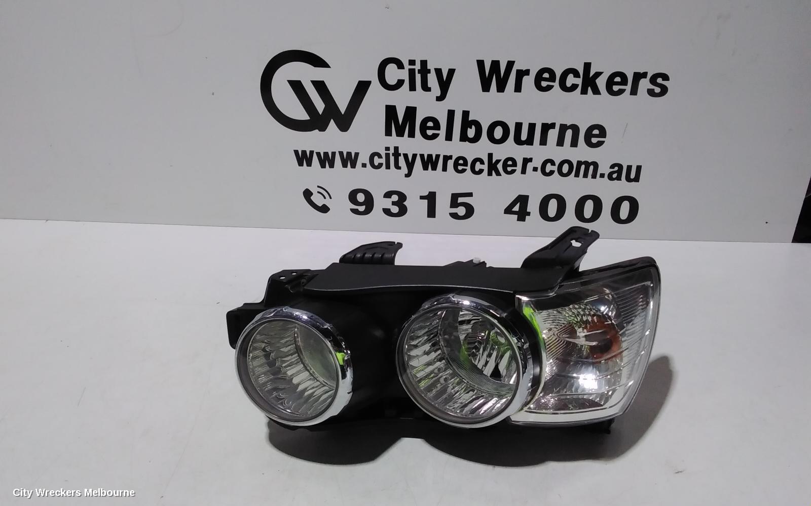 HOLDEN BARINA LEFT HEADLAMP, TM, W/ CHROME RING TYPE, 11/2011 - 08/2016 - Image 1
