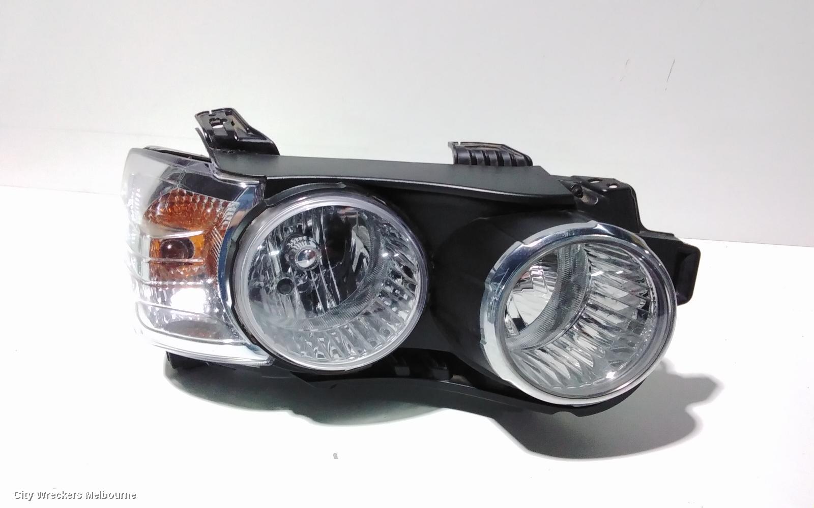 HOLDEN BARINA RIGHT HEADLAMP, TM, W/ CHROME RING TYPE, 08/2011 - 08/2016 - Image 1