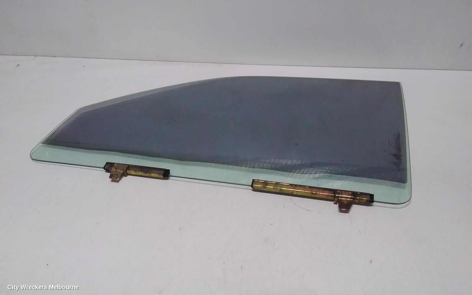 MITSUBISHI CHALLENGER LEFT FRONT DOOR WINDOW, TINTED, PA, 05/1996 - 01/2006 - Image 1