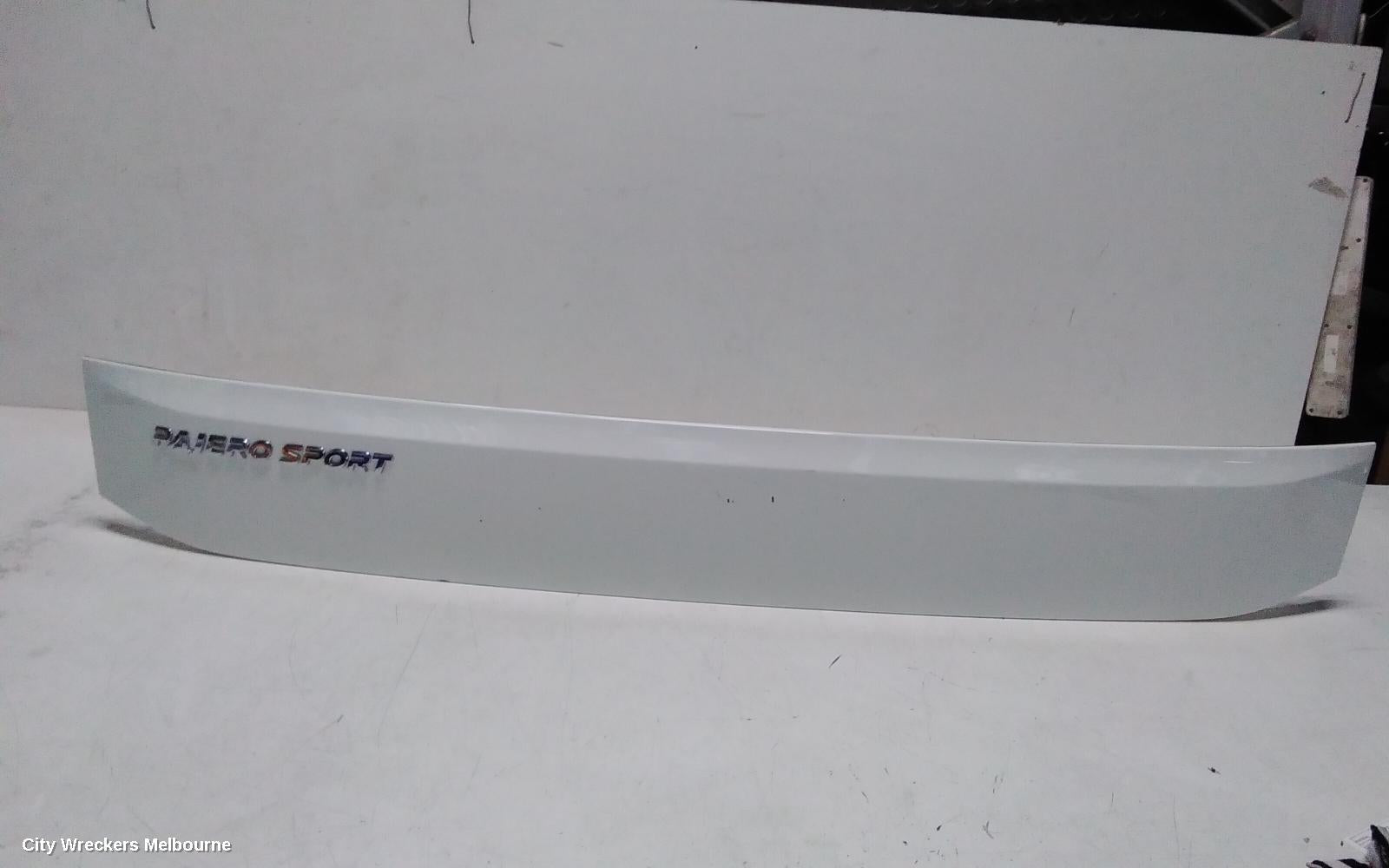 MITSUBISHI PAJERO REAR GARNISH, TAILGATE GARNISH (LOWER), PAJERO SPORT, QE-QG, 10/2015 ONWARDS - Image 1