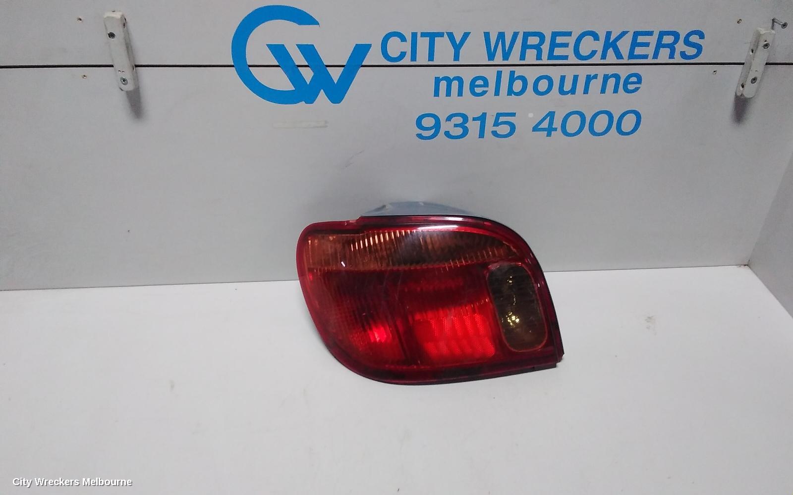 TOYOTA ECHO LEFT TAILLIGHT, NCP10R, HATCH, LENS# 52-049, 10/2002 - 09/2005 - Image 1