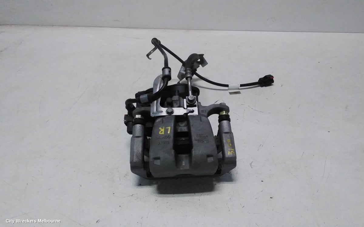 TESLA MODEL Y CALIPER, 1ST GEN, LH REAR, 1 PISTON TYPE, NON PERFORMANCE, 03/2022 - 02/2025 - Image 1
