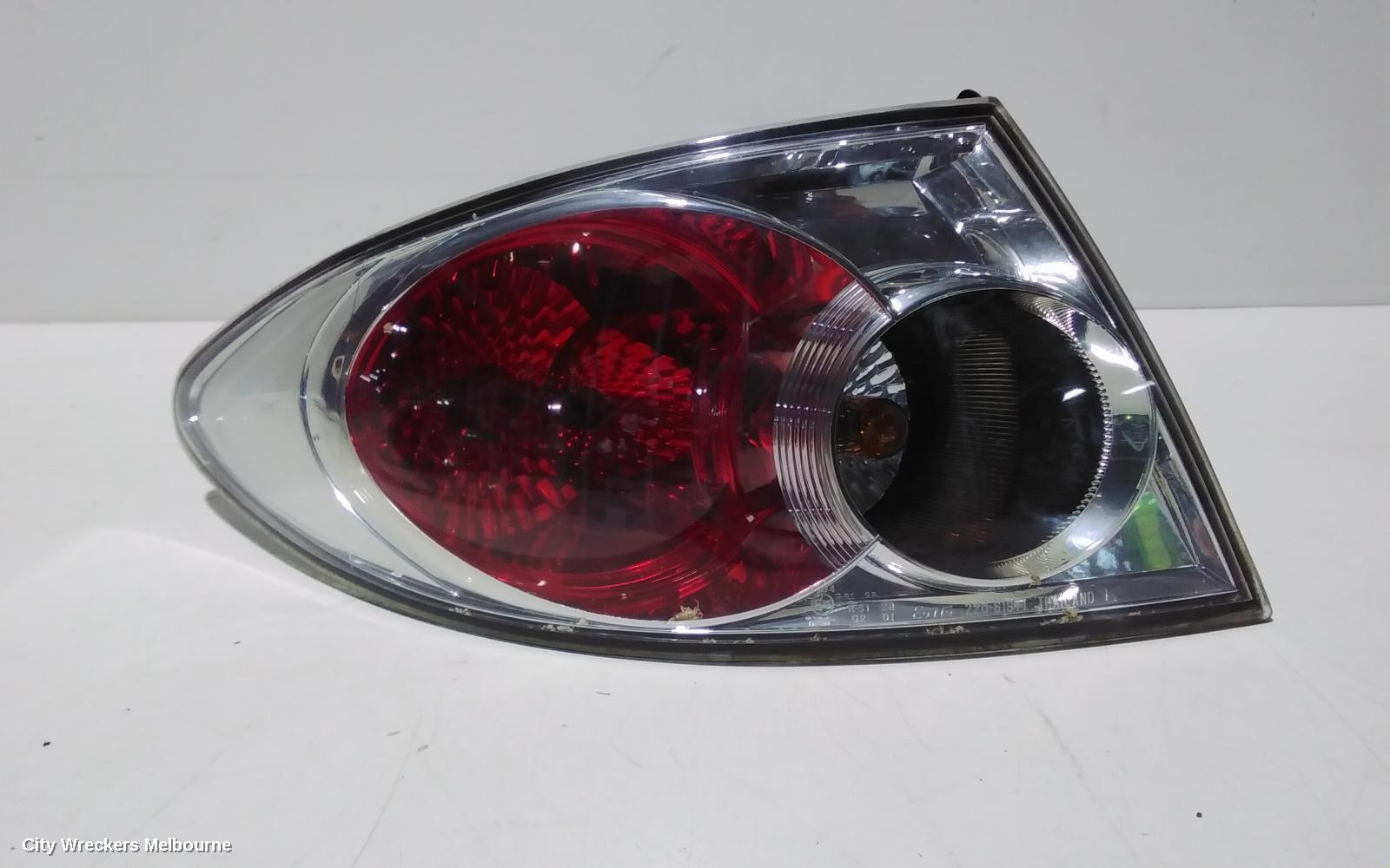 MAZDA 6 LEFT TAILLIGHT, GG/GY, SEDAN/HATCH, LENS# 220-61971, 09/2002 - 08/2005 - Image 1