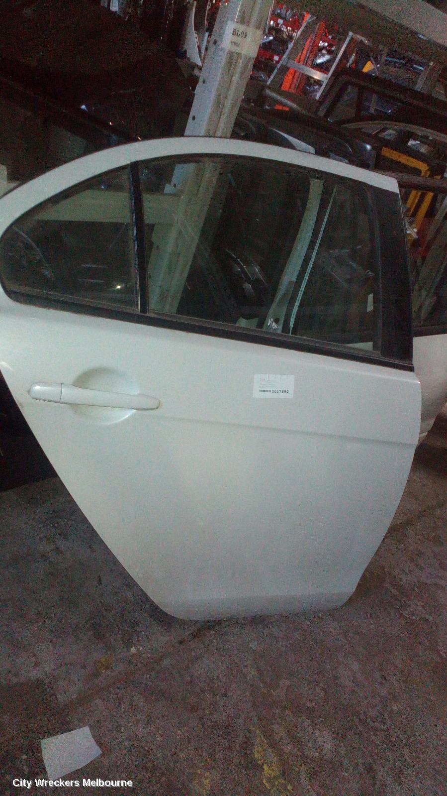 MITSUBISHI LANCER RIGHT REAR DOOR, CF, SEDAN/HATCH, 11/2015 - 12/2017 - Image 1