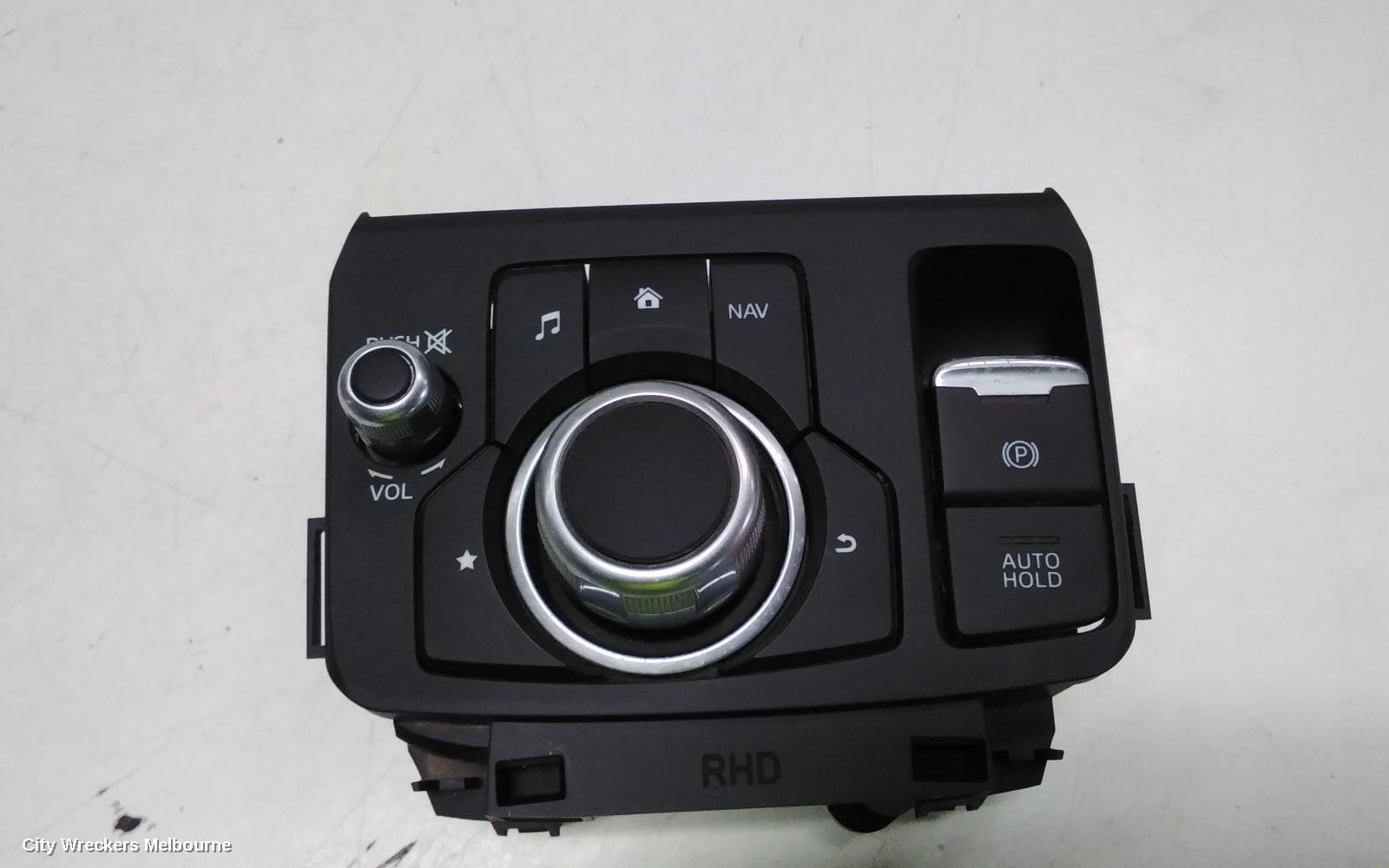 MAZDA CX3, MULTIMEDIA HUB SWITCH (CENTRE CONSOLE), W/ ELECTRIC HANDBRAKE TYPE, DK, 03/2015 ONWARDS - Image 1