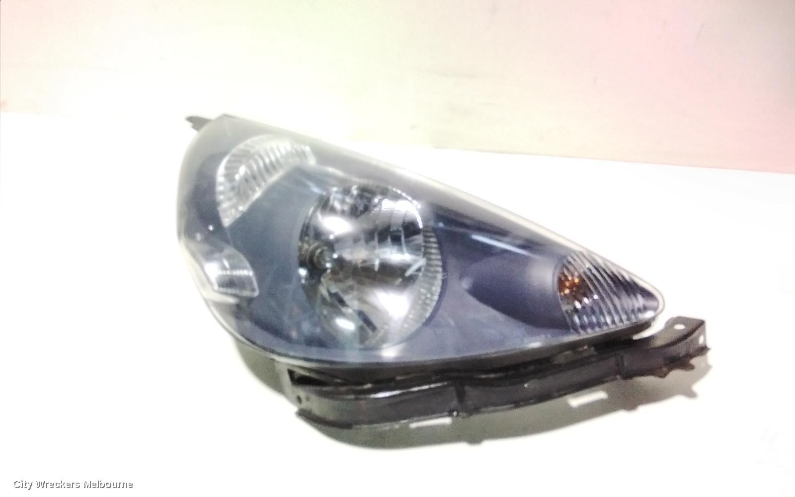 HONDA JAZZ RIGHT HEADLAMP, GD, 1.5 ENG, BLACK INNER, CHROME INSERT TYPE, MANUAL ADJ, LENS# 4944, 10/2004 - 09/2008 - Image 1