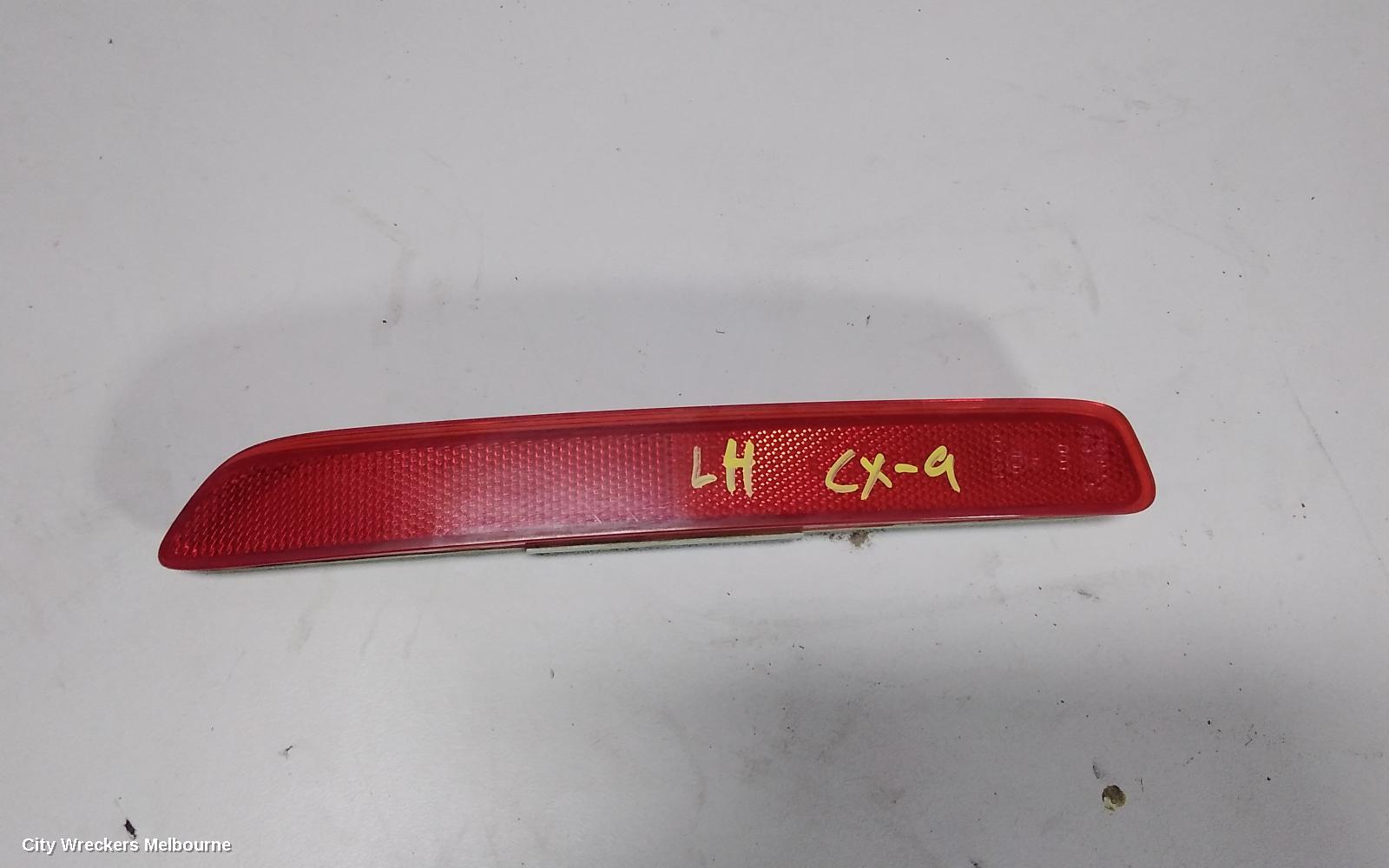 MAZDA CX9, TB, 12/2007 - 12/2015, BAR REFLICTOR LEFT: 60308 - Image 1