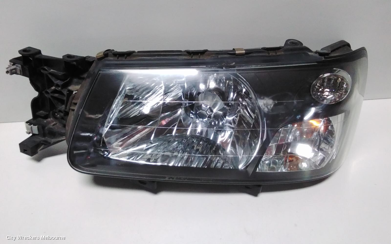 SUBARU FORESTER LEFT HEADLAMP, BLACK INSERT (CURVED LINES), LENS# 1700, 08/2004 - 05/2005 - Image 3