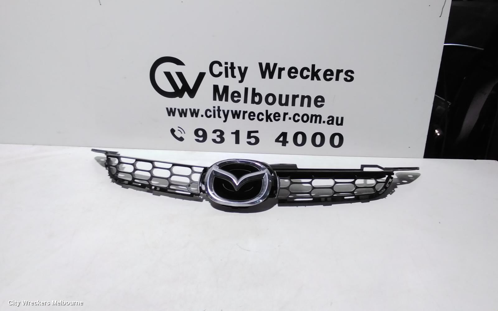 MAZDA CX7 GRILLE, RADIATOR GRILLE, ER, 11/2006 - 09/2009 - Image 1