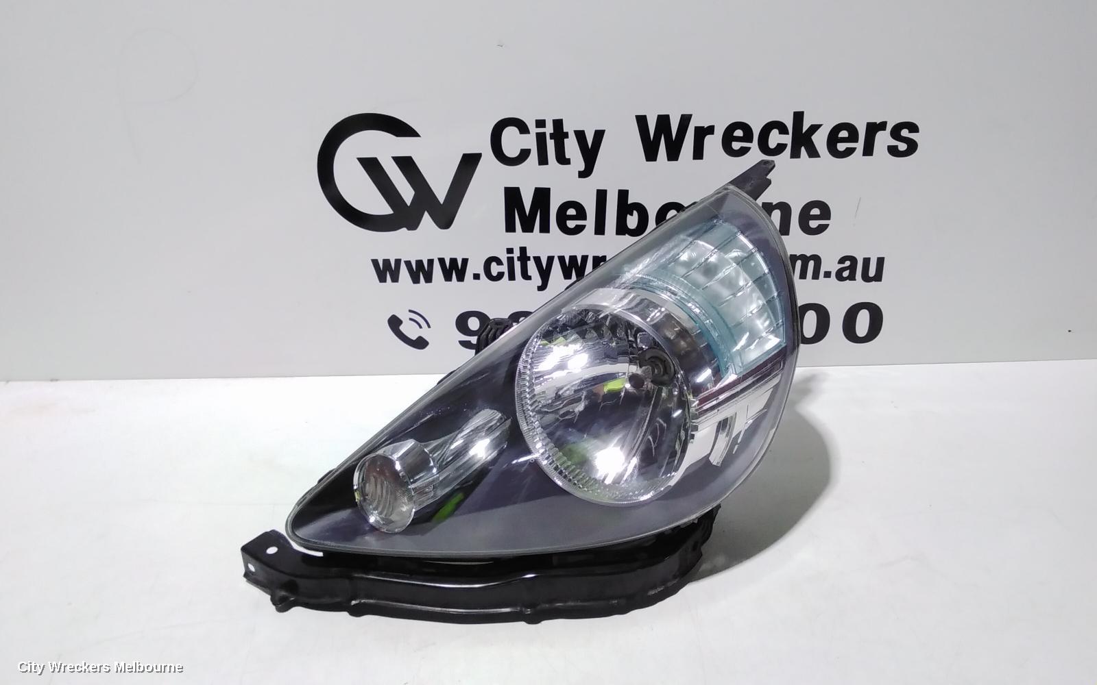 HONDA JAZZ LEFT HEADLAMP, GD, 1.3 ENG, BLACK INSERT TYPE, LENS# 4944, 10/2004 - 09/2008 - Image 1