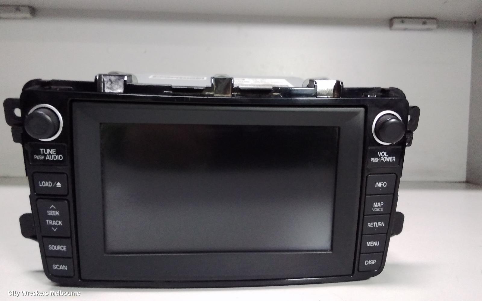 MAZDA CX9 RADIO/CD/DVD/SAT/TV, DISPLAY UNIT, SAT NAV TYPE (P/N TE7766DV0), 09/2008 - 11/2012 - Image 1