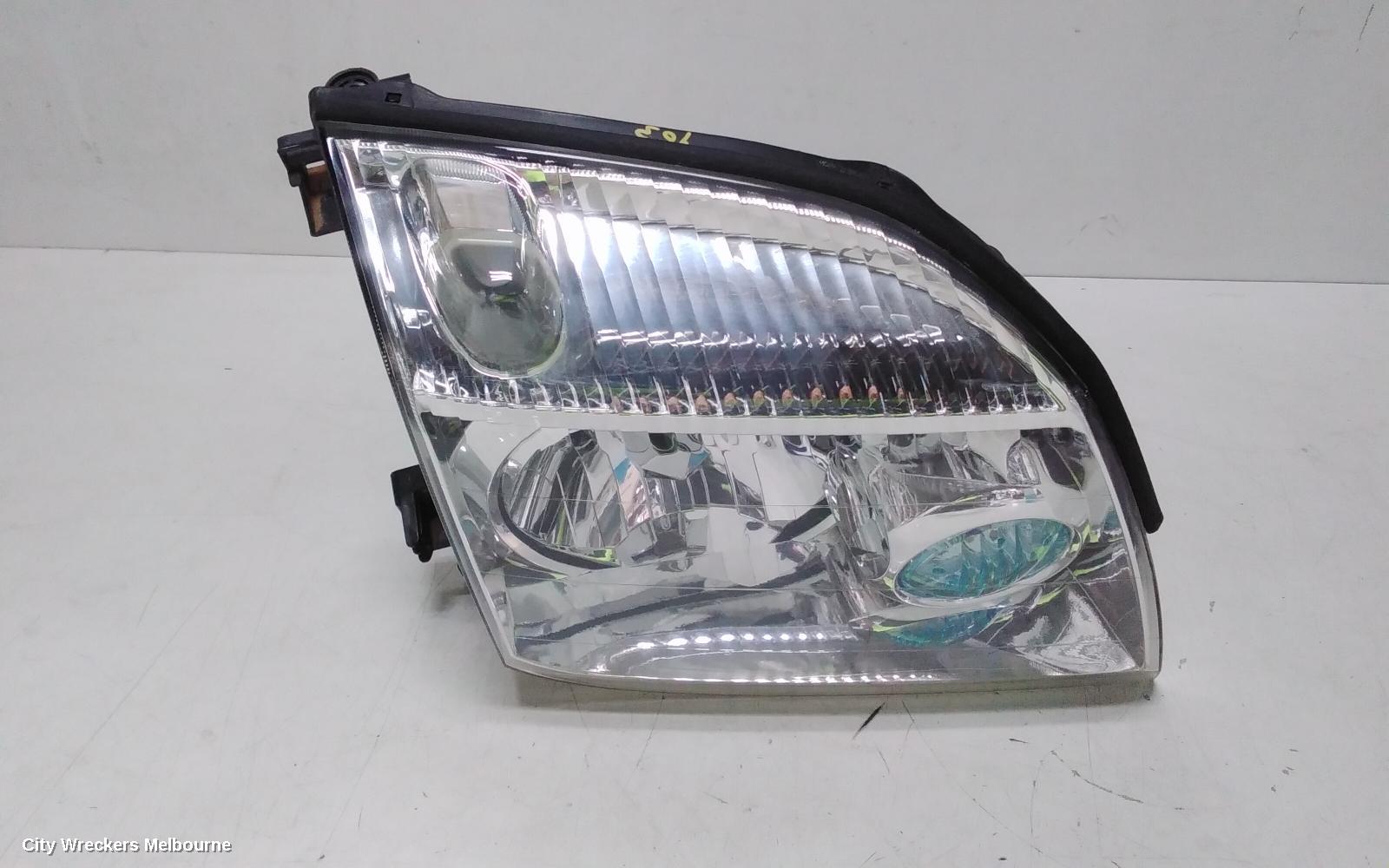NISSAN XTRAIL RIGHT HEADLAMP, T30, BLUE LENS TYPE, 10/2001 - 09/2007 - Image 1