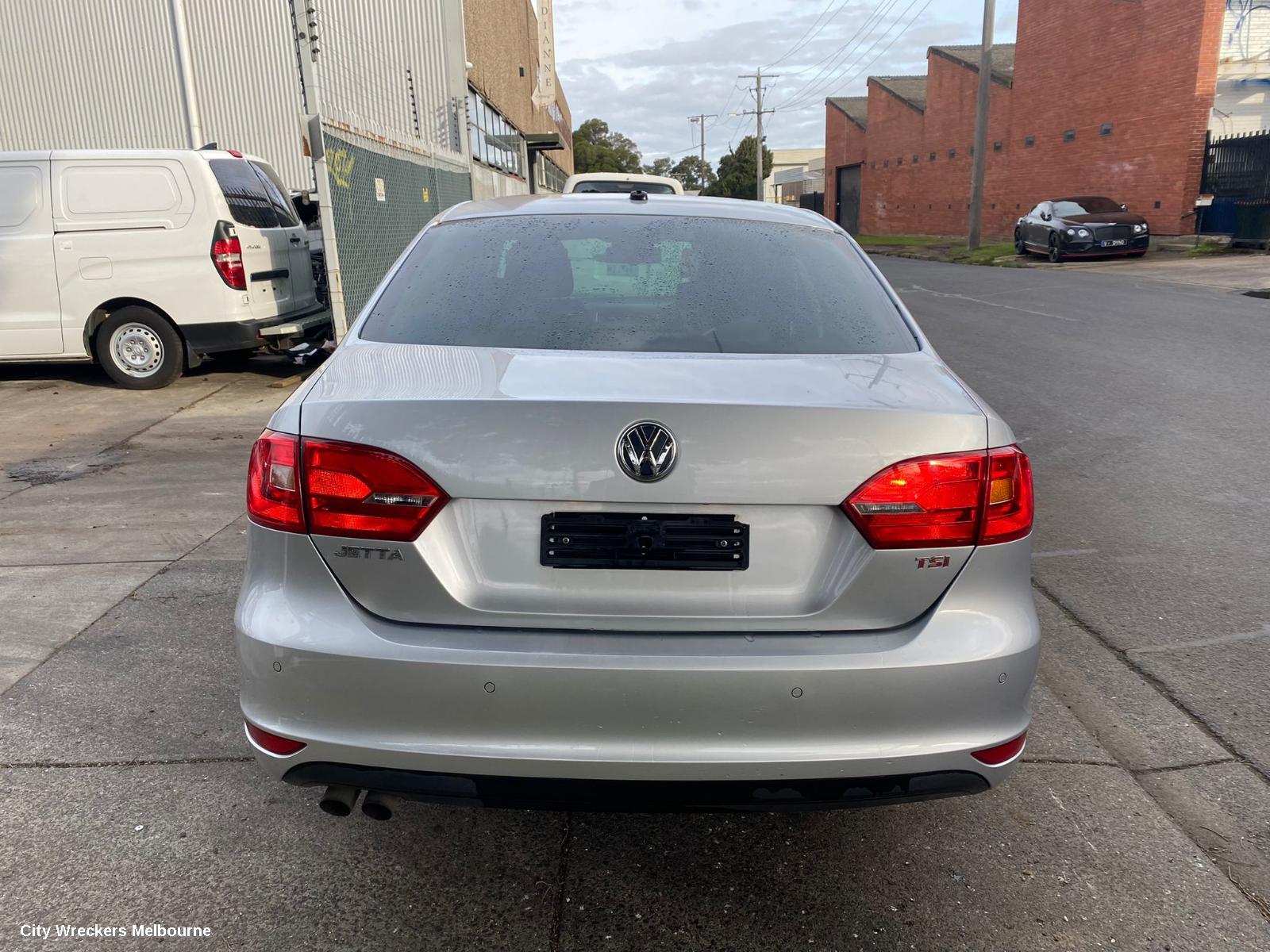 VOLKSWAGEN JETTA REAR BUMPER, 1B, W/ PARK SENSORS TYPE, 02/2011 - 10/2014 - Image 1