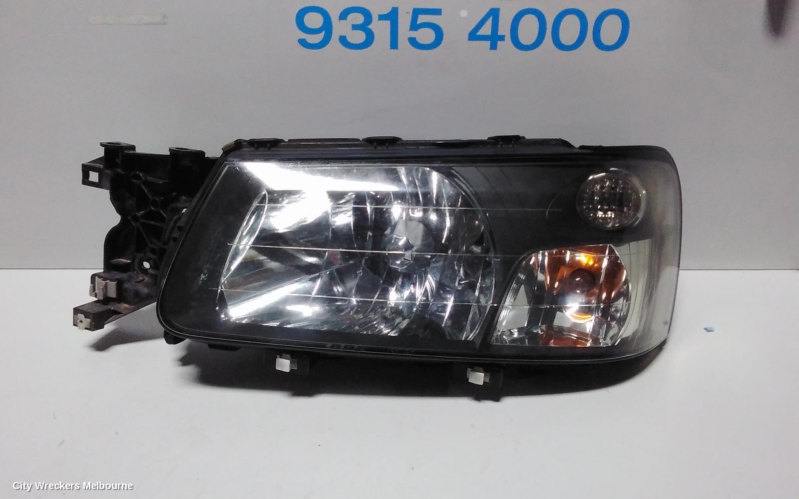 SUBARU FORESTER LEFT HEADLAMP, BLACK INSERT (CURVED LINES), LENS# 1700, 08/2004 - 05/2005 - Image 2