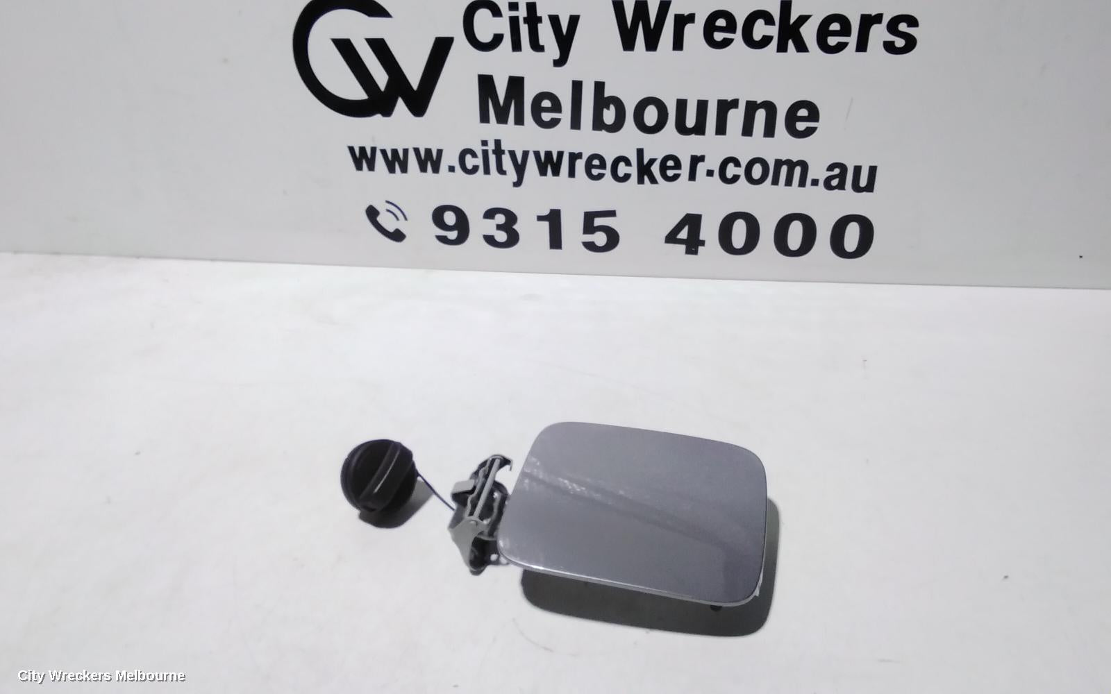 SUZUKI BALENO FUEL DOOR / FILLER, EW, 04/2016 - 12/2022 - Image 1