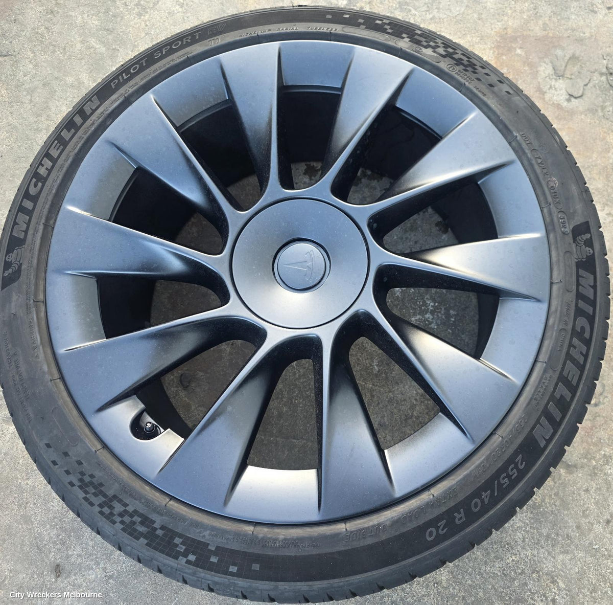 TESLA MODEL Y WHEEL MAG, 1ST GEN, FACTORY, 20X9.5IN, INDUCTION, 10 SINGLE SPOKE, MATTE BLACK, 03/2022 - 02/2025 - Image 1