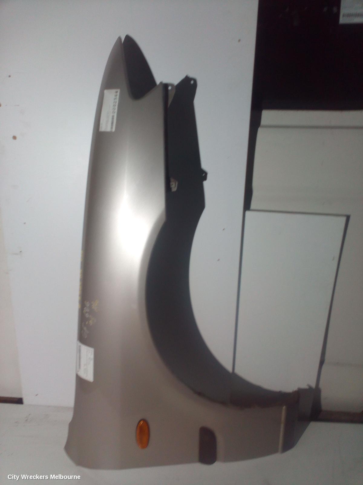 MAZDA 626 RIGHT GUARD, GF, SEDAN/HATCH, GLUED ON MOULD, W/ REPEATER TYPE, 08/1997 - 11/1999 - Image 1