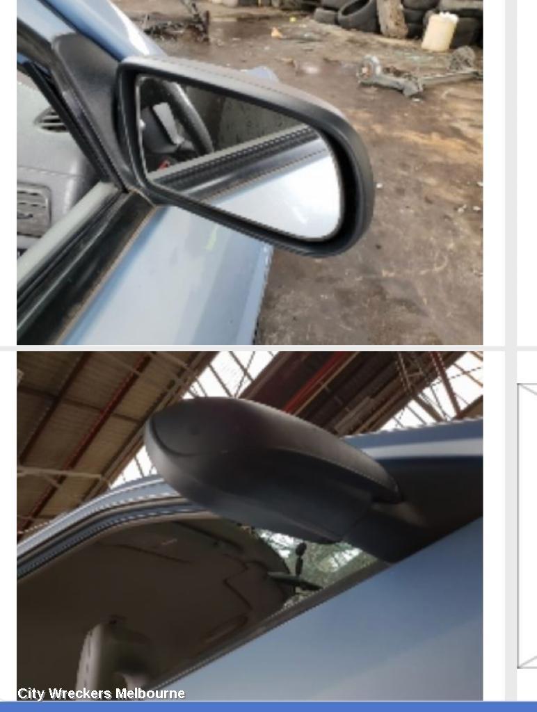 MAZDA 121 RIGHT DOOR MIRROR, METRO, MANUAL TYPE, 03/2000 - 08/2002 - Image 1