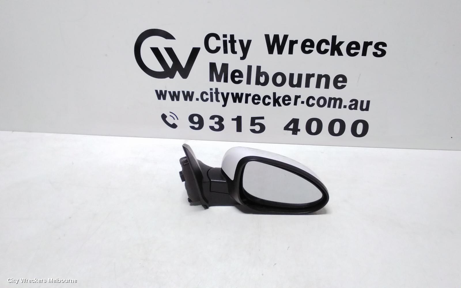 HOLDEN BARINA RIGHT DOOR MIRROR, TM, COLOUR CODED, 09/2011 - 12/2018 - Image 1