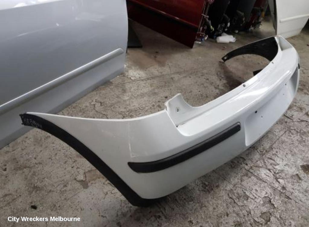 HOLDEN BARINA REAR BUMPER, BUMPER BAR, HATCH, LAST 8 DIGITS OF VIN IS FROM  44000001-, (REFLECTORS ON BOTTOM), XC, 03/2001 - 11/2005 - Image 2