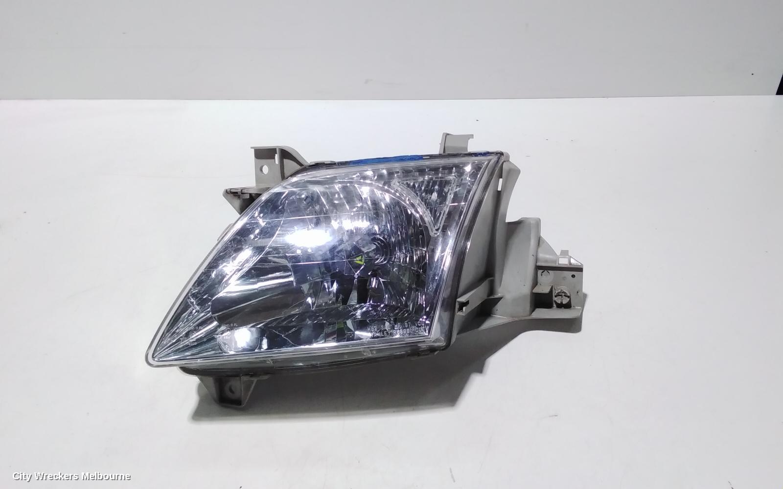 MAZDA MPV LEFT HEADLAMP, LW, LENS # STANLEY R6899, 08/1999 - 05/2002 - Image 1