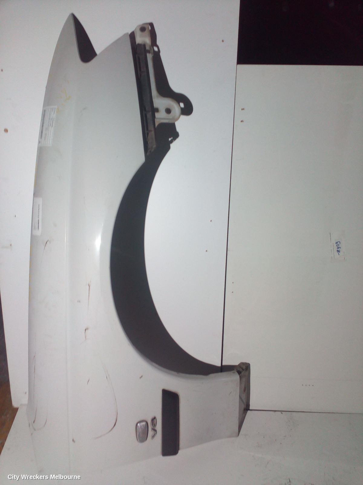 HOLDEN COMMODORE RIGHT GUARD, VY1-VZ, NON FLARE TYPE, 10/2002 - 09/2007 - Image 1