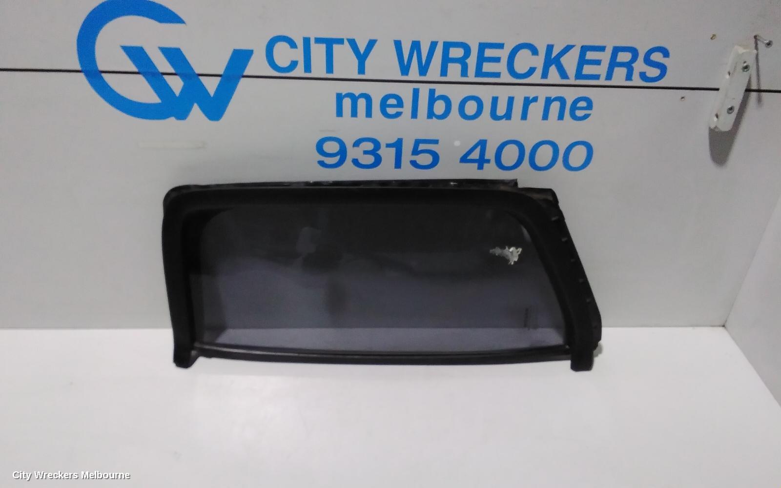NISSAN NAVARA LEFT REAR 1/4 DOOR GLASS, D40, 09/2005 - 08/2015 - Image 1