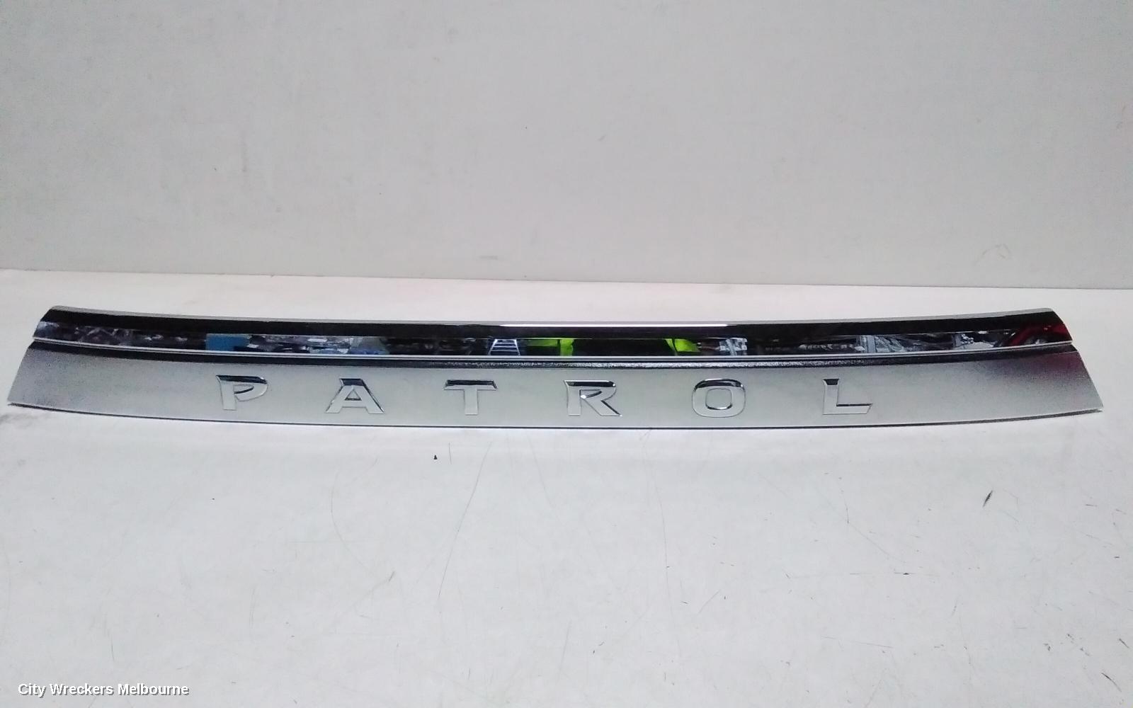 NISSAN PATROL REAR GARNISH, Y62, TAILGATE GARNISH (CENTRE), 10/2019 ONWARDS - Image 2