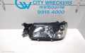 SUBARU FORESTER LEFT HEADLAMP, BLACK INSERT (CURVED LINES), LENS# 1700, 08/2004 - 05/2005 - Image 1